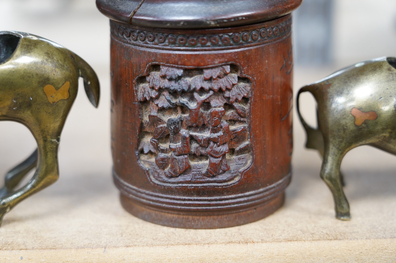 Two 19th century Chinese bronze, copper and silver inlaid censers in the form of animals and a bamboo tea caddy, largest 14cm high. Condition - fair